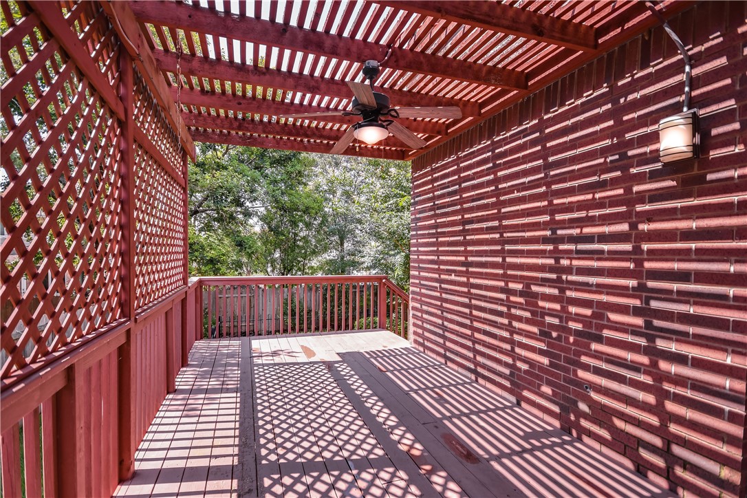3513 Grimes Ranch Road Austin, TX 78732 - Photo 17 of 32 Wooden terrace featuring ceiling fan and a pergola