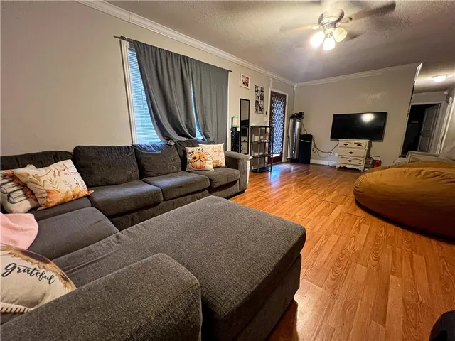 a bedroom with bed and window