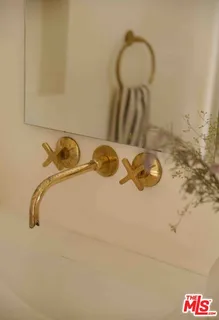 a view of a house with swimming pool and sitting area