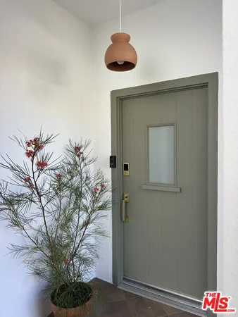 a vase of flowers sitting on a table