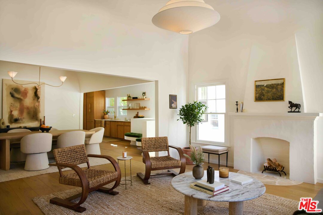 3234 Lowry Road Los Angeles, CA 90027 - Photo 7 of 56 a living room with furniture and a fireplace
