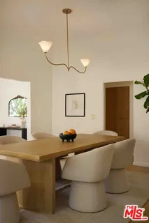 a living room with couch and a table