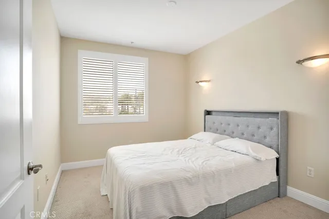 a bathroom with a granite countertop toilet a sink and a bathtub