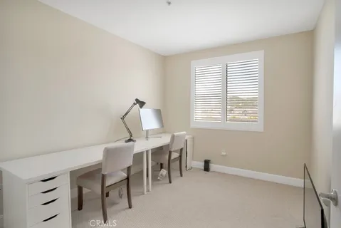 a kitchen with granite countertop a refrigerator stove and microwave