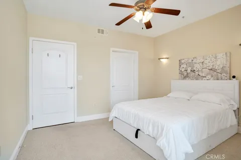 a bathroom with a shower and a toilet