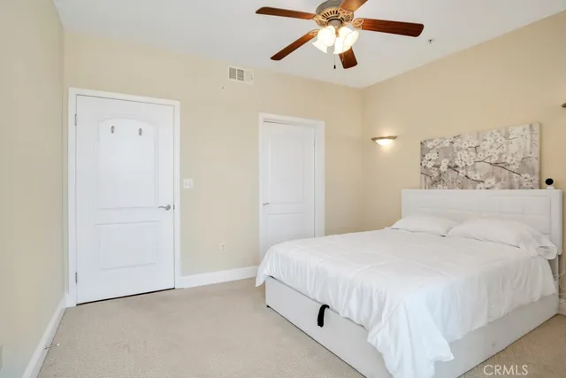 a bathroom with a shower and a toilet