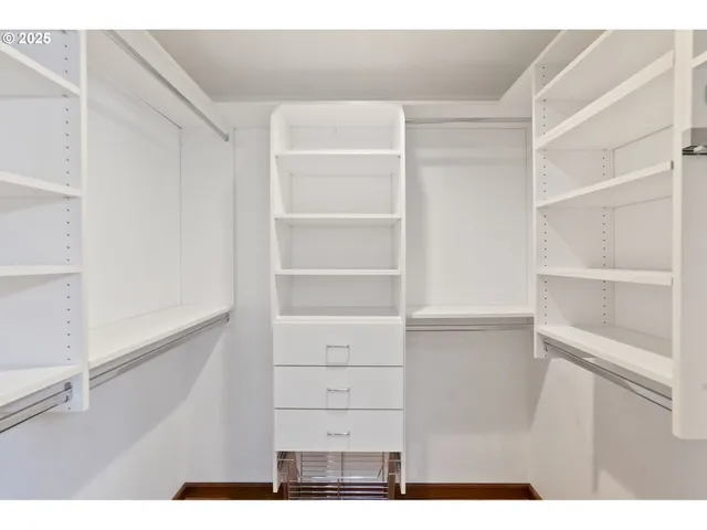 a view of an empty walk in closet