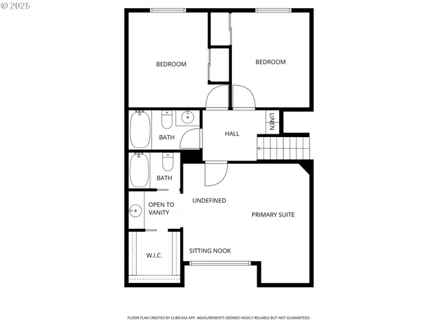 a picture of a bench in front of a wall