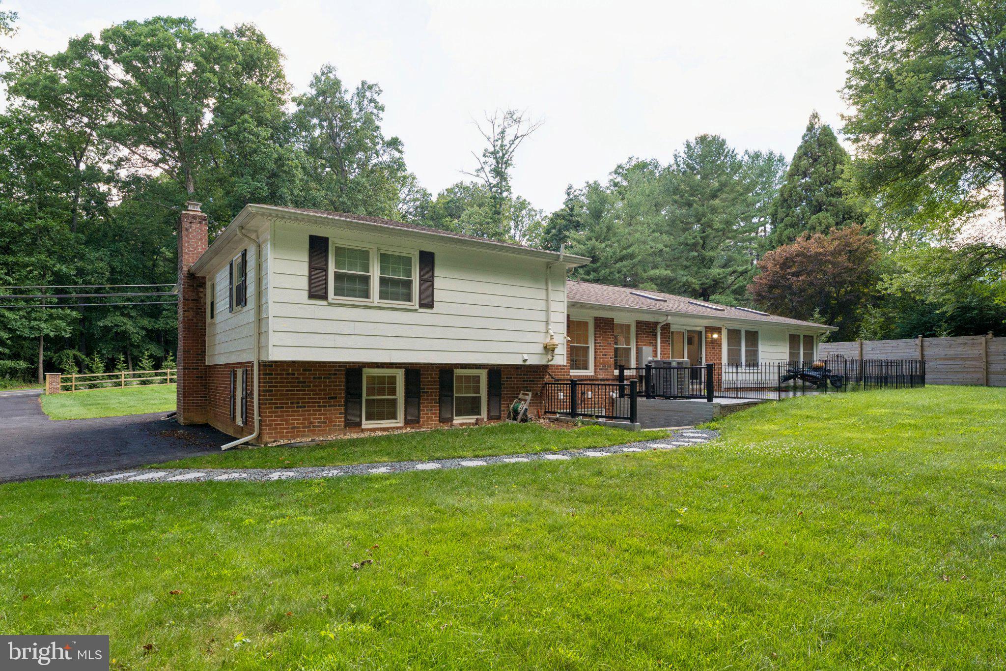 3219 Fox Mill Road Oakton, VA 22124 - Photo 65 of 87 Charming home with lush green surroundings.
