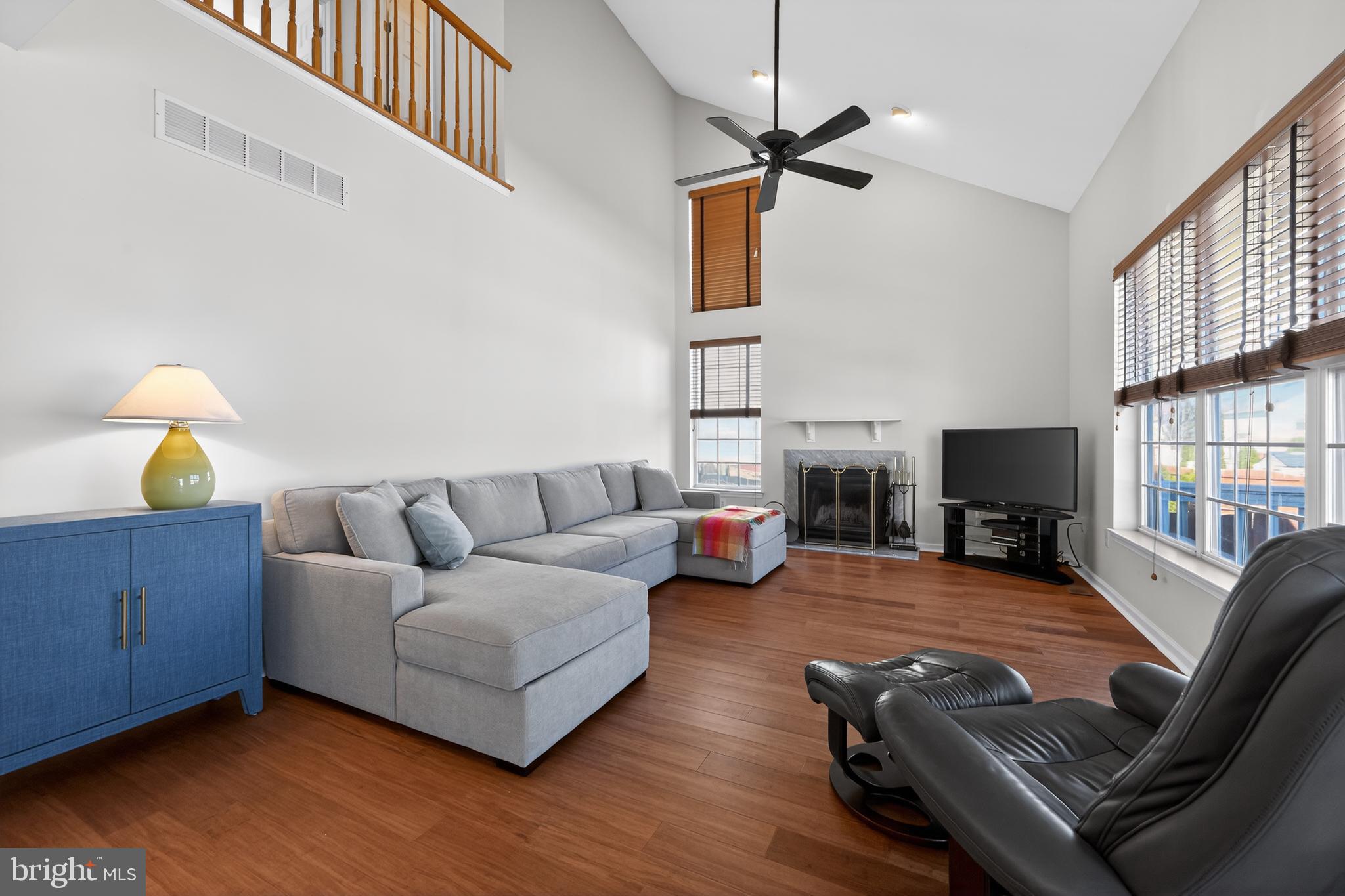 20 Colts Gait Road Marlton, NJ 08053 - Photo 13 of 36 a living room with furniture and a fireplace