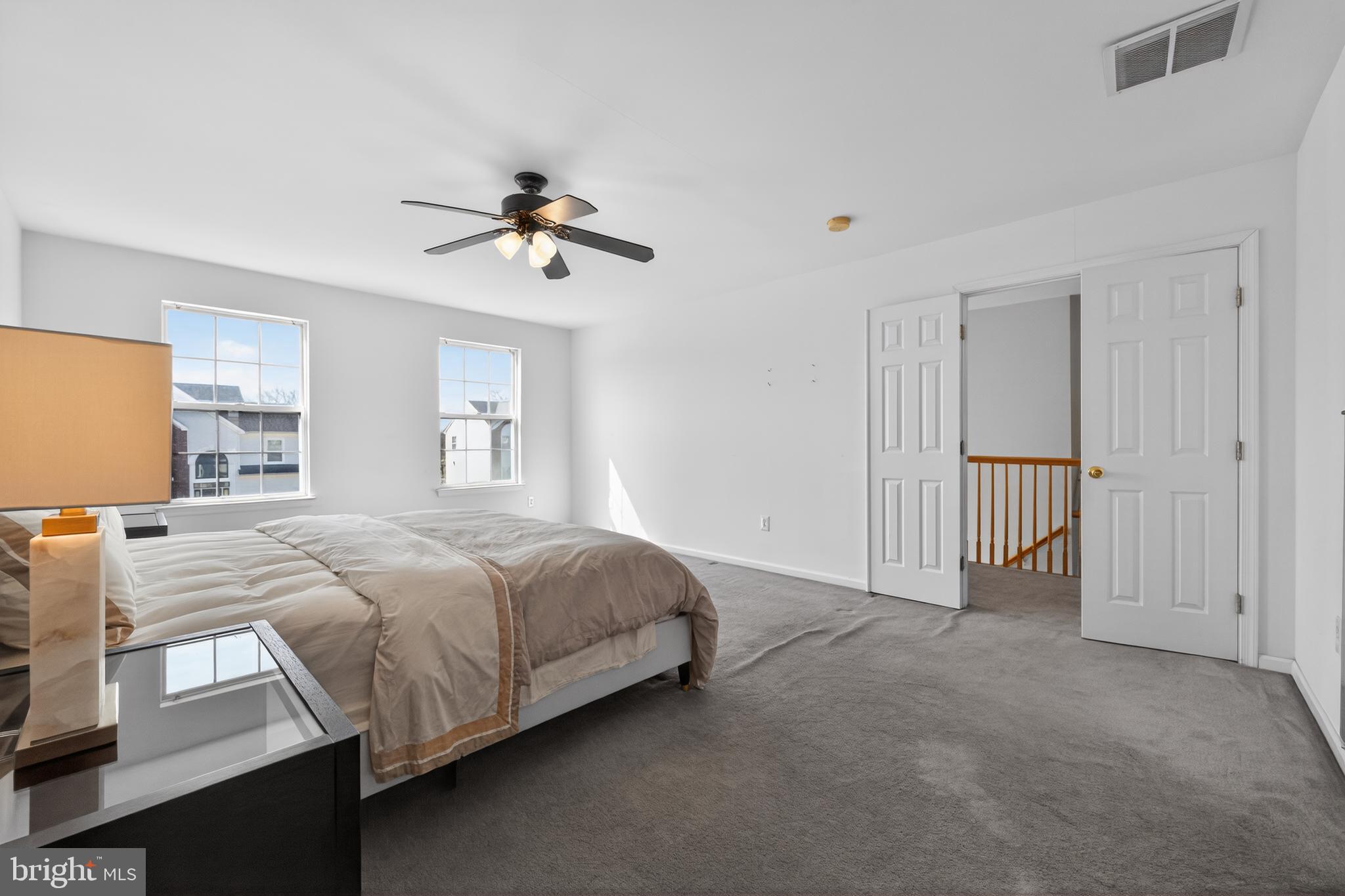 20 Colts Gait Road Marlton, NJ 08053 - Photo 18 of 36 a spacious bedroom with a bed and a lamp
