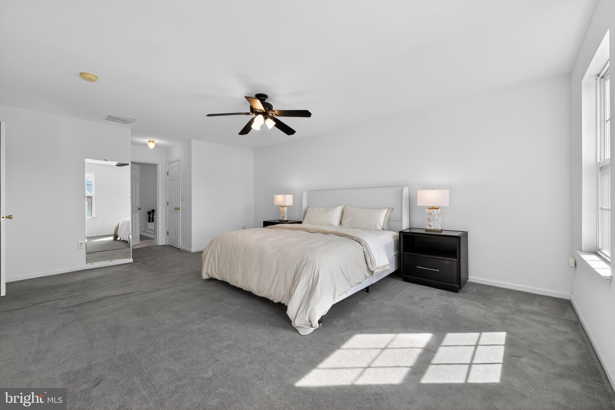 20 Colts Gait Road Marlton, NJ 08053 - Photo 20 of 36 a bedroom with a bed and a painting on the wall