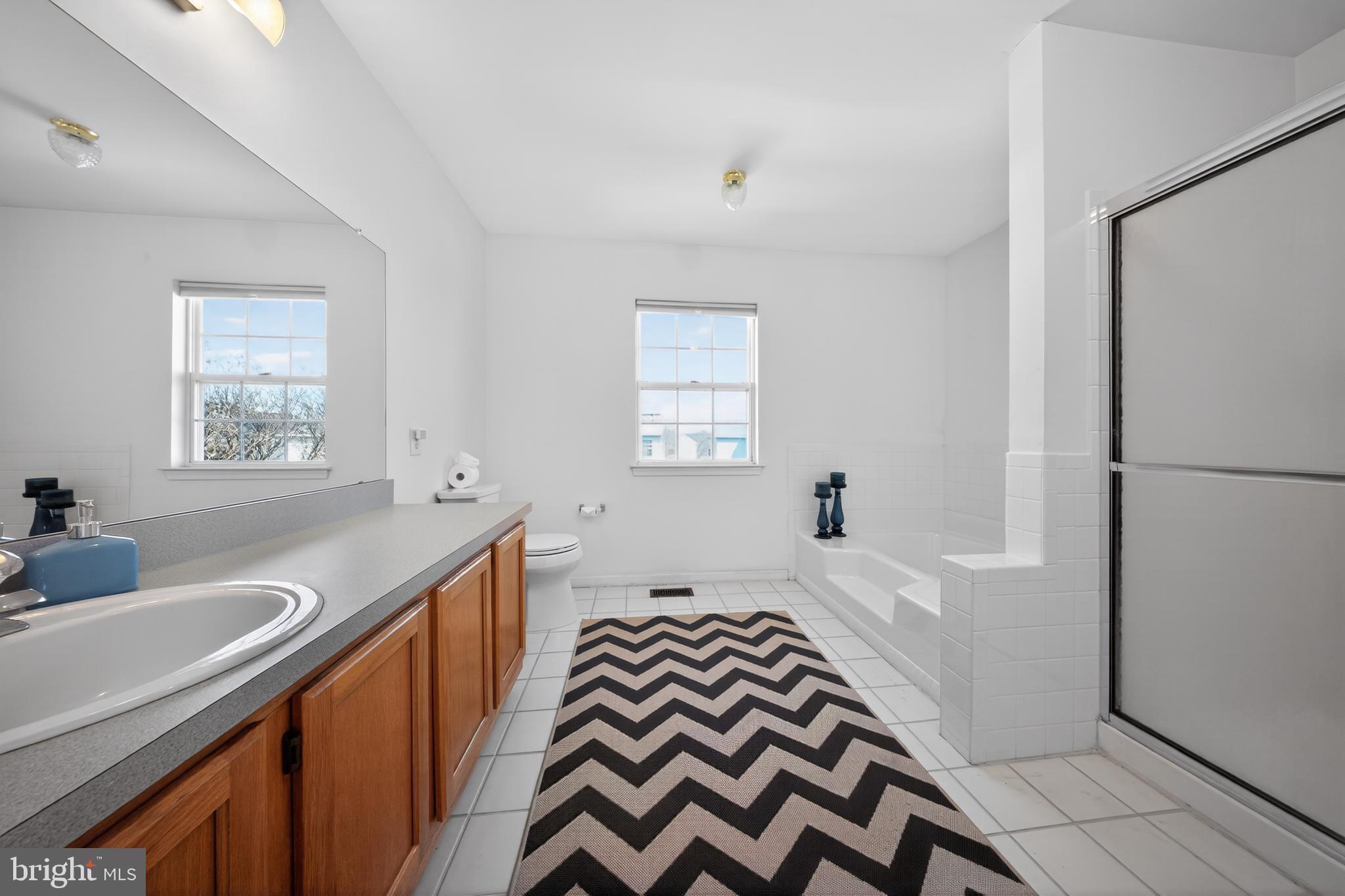 20 Colts Gait Road Marlton, NJ 08053 - Photo 21 of 36 a bedroom with a bed and a dresser with wooden floor