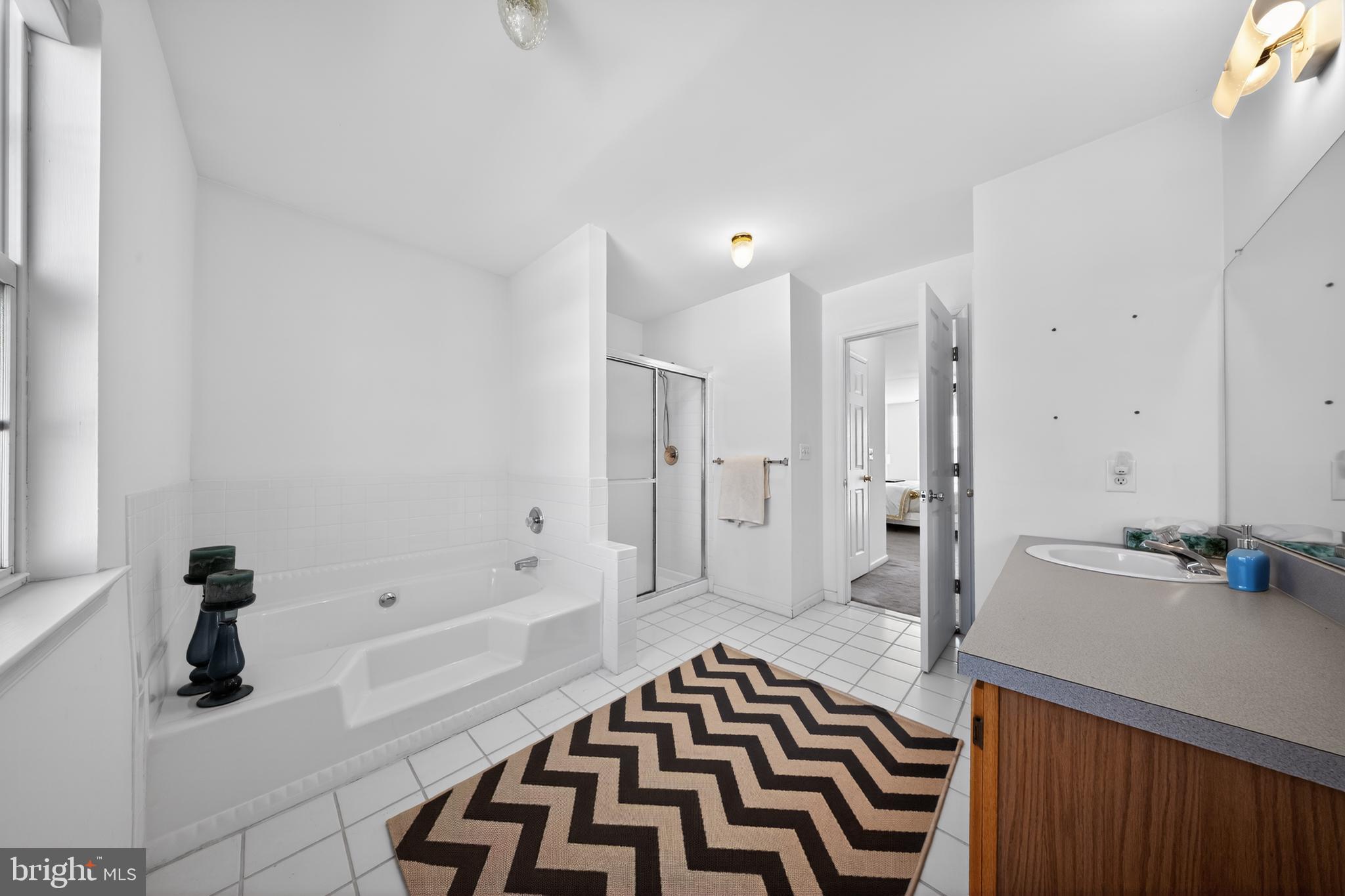 20 Colts Gait Road Marlton, NJ 08053 - Photo 22 of 36 a bathroom with a sink a toilet a shower and a mirror