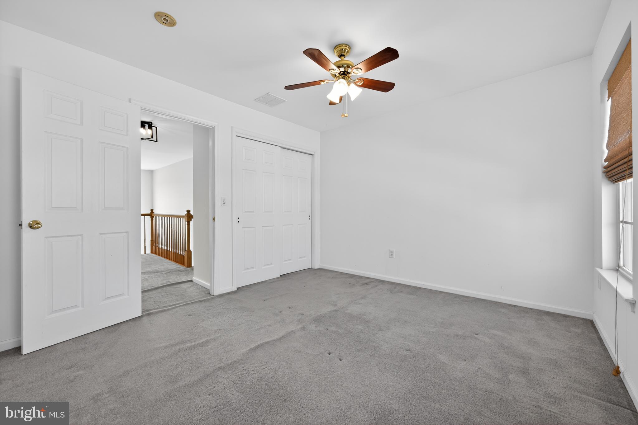 20 Colts Gait Road Marlton, NJ 08053 - Photo 27 of 36 an empty room with closet and a ceiling fan