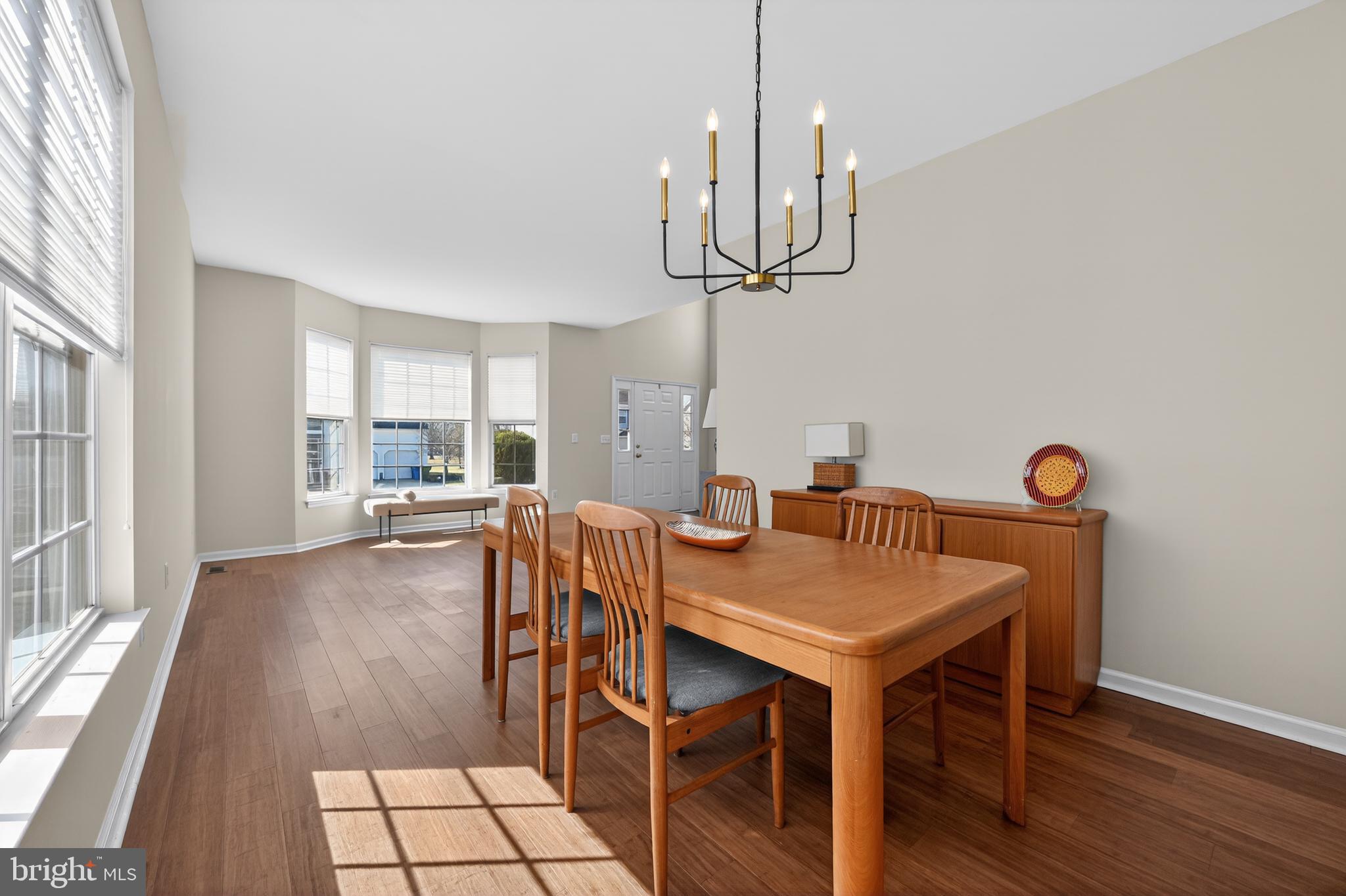 20 Colts Gait Road Marlton, NJ 08053 - Photo 5 of 36 a view of a dining room with furniture wooden floor and chandelier