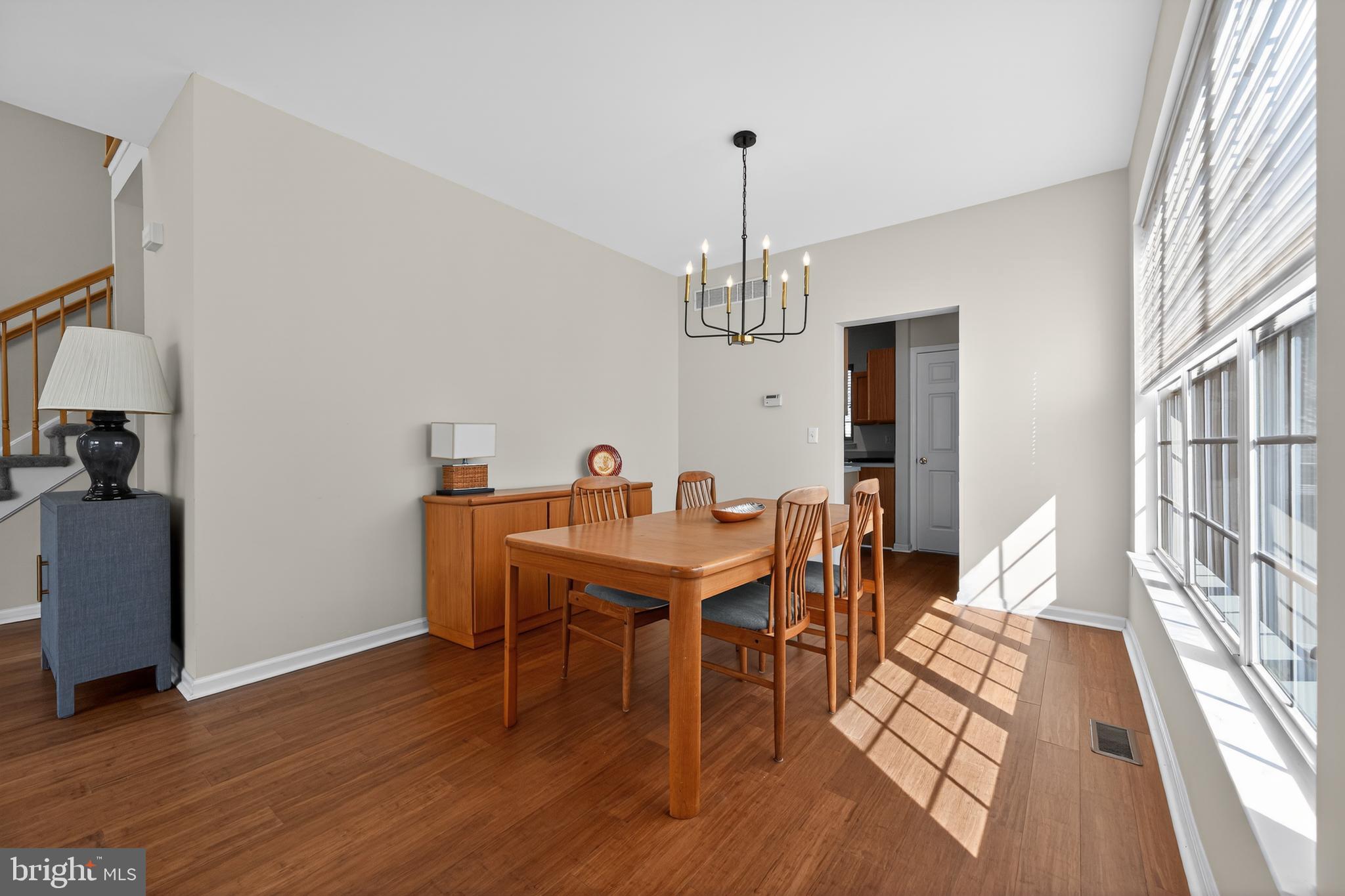 20 Colts Gait Road Marlton, NJ 08053 - Photo 6 of 36 a view of a dining room with furniture and wooden floor