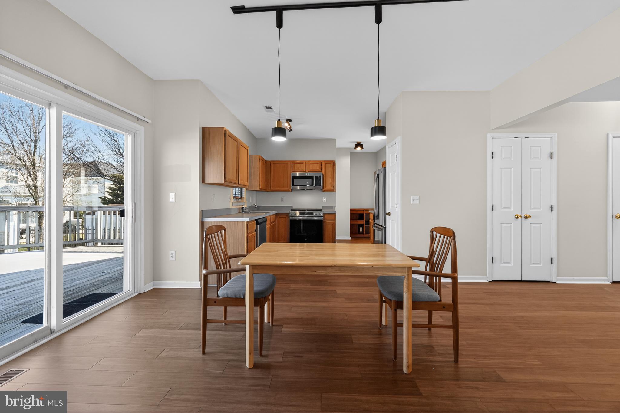 20 Colts Gait Road Marlton, NJ 08053 - Photo 10 of 36 a view of a dining room with furniture window and wooden floor