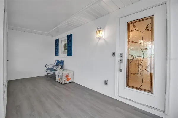 a living room with furniture and a gate