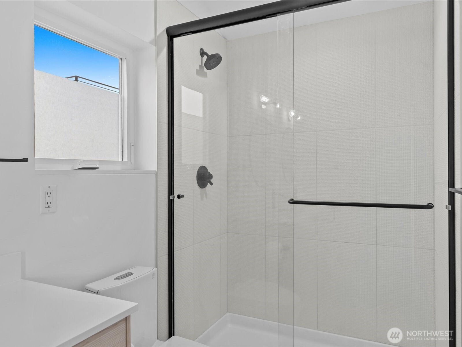 3239 61st Avenue Southwest, Unit B Seattle, WA 98116 - Photo 21 of 30 a bathroom with a shower and a sink