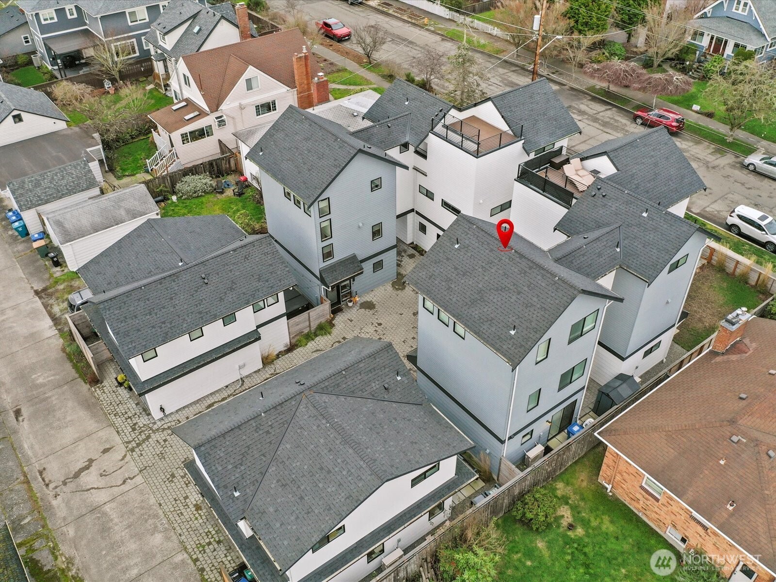 3239 61st Avenue Southwest, Unit B Seattle, WA 98116 - Photo 23 of 30 an aerial view of a house with a yard