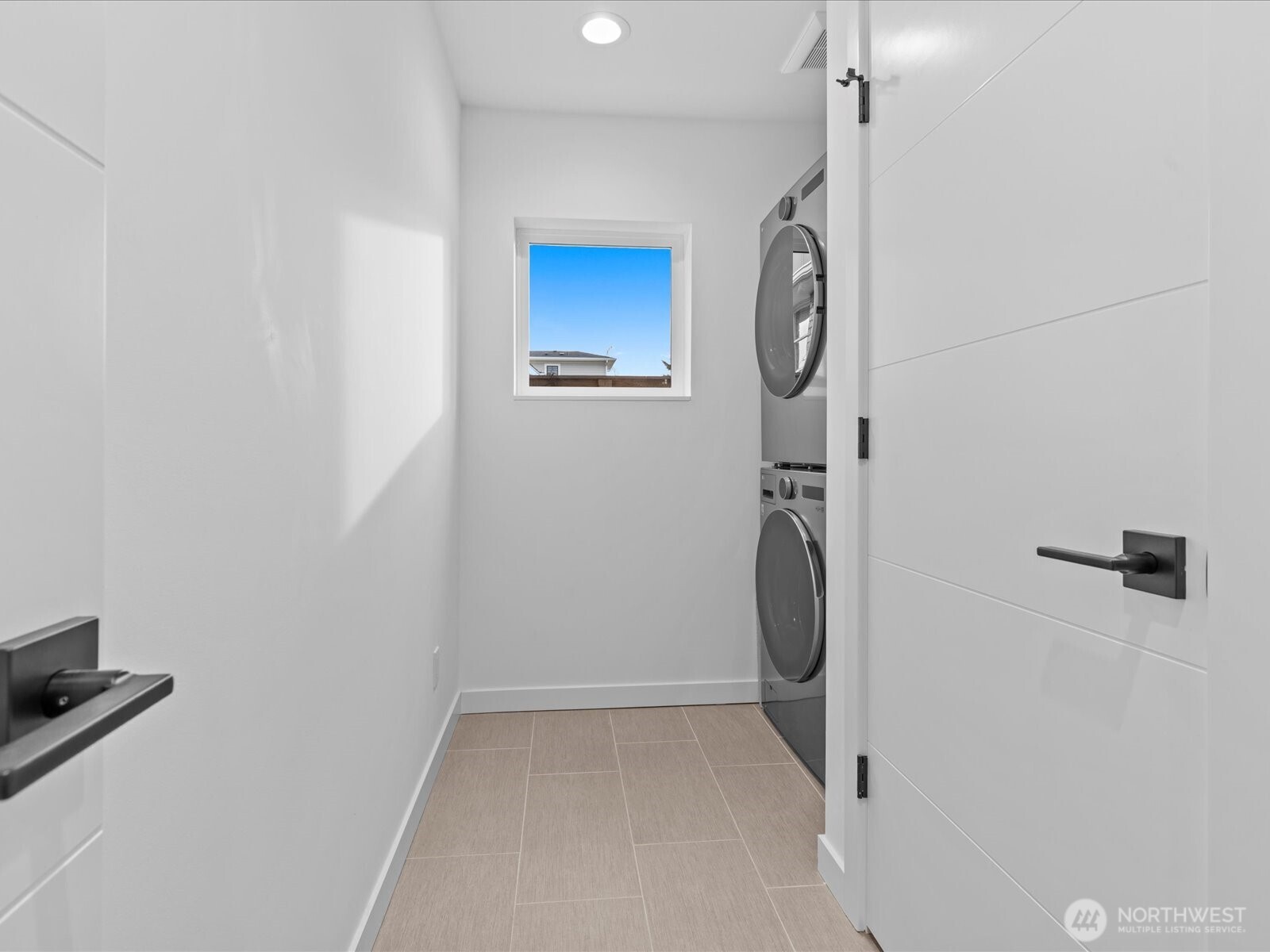 3239 61st Avenue Southwest, Unit B Seattle, WA 98116 - Photo 7 of 30 a view of hallway with washer and dryer