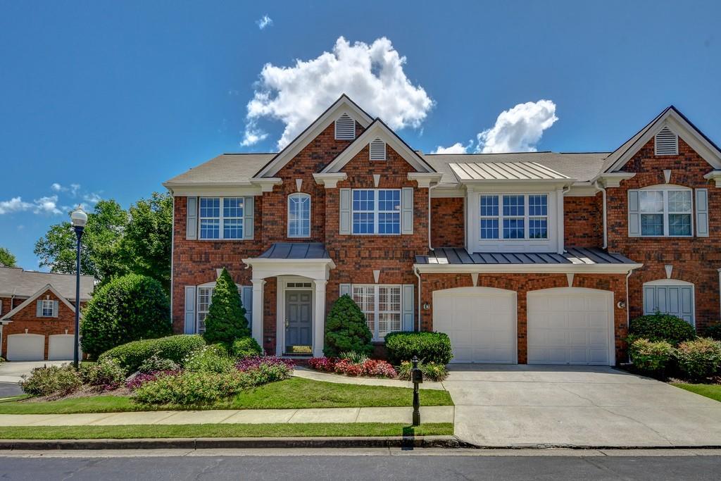 2328 Ventana Crossing, Unit 11 Marietta, GA 30062 - Photo 1 of 1 Very Hard to find 4 Sided Brick End Unit with Master on Main situated in coveted East Cobb location.