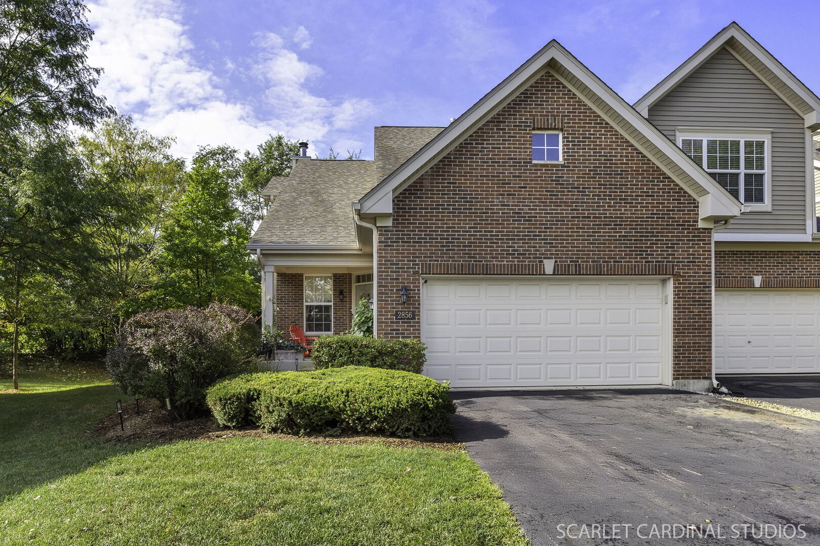 2856 Church Road Aurora, IL 60502 - Photo 1 of 1 a front view of a house with a yard and garage
