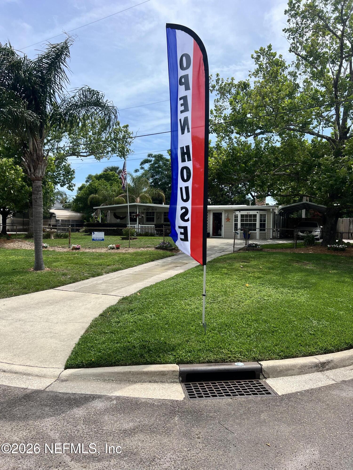 43 Forrestal Circle North Atlantic Beach, FL 32233 - Photo 3 of 39 a view of a park with swings