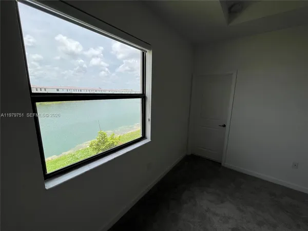 an empty room with windows