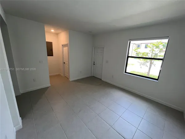 an empty room with windows