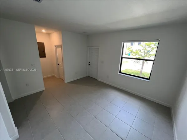 an empty room with a window