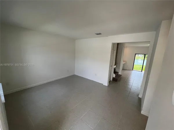 an empty room with a window