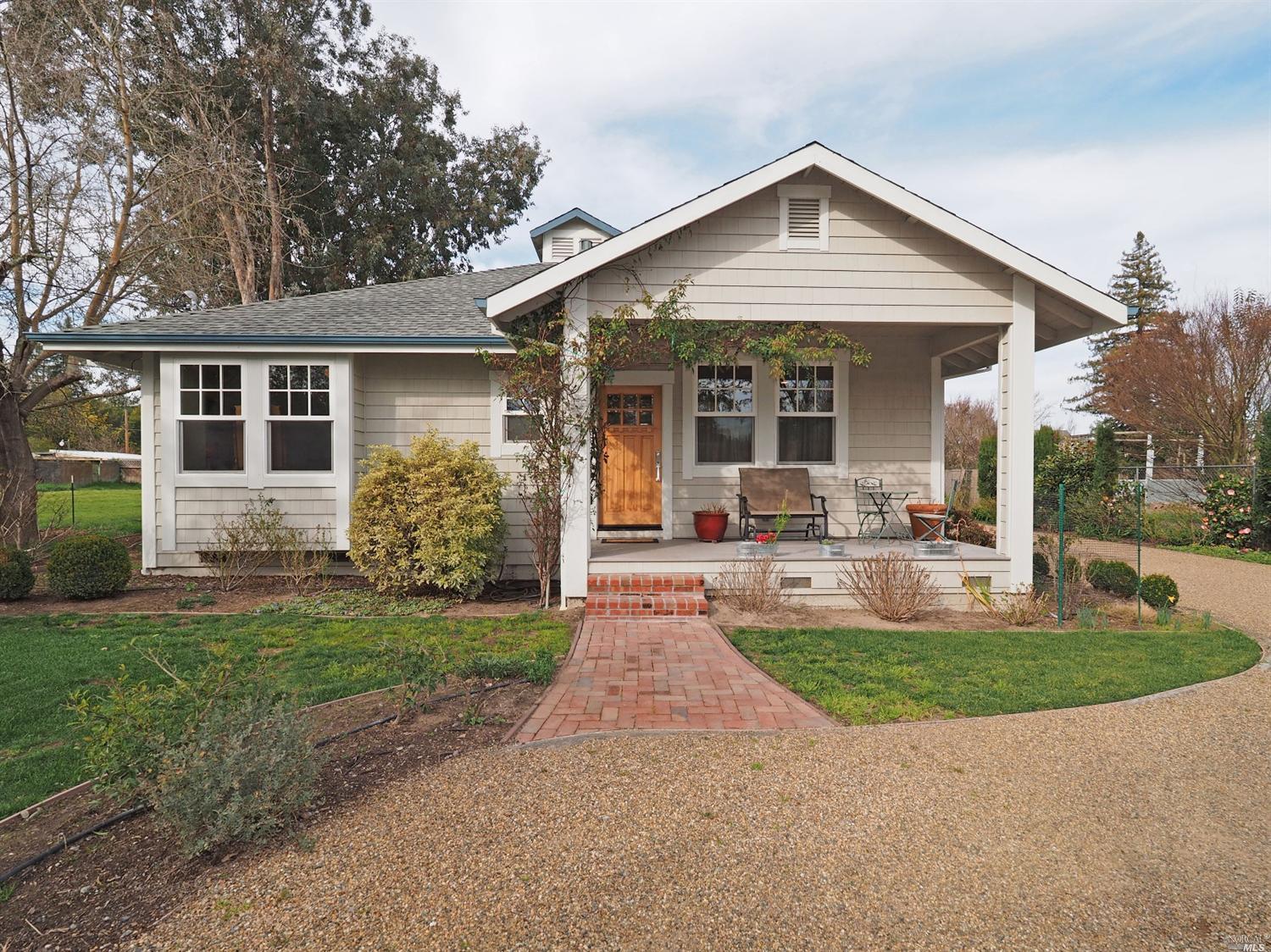 7110 Elphick Road Sebastopol, CA 95472 - Photo 1 of 1 a front view of a house with garden