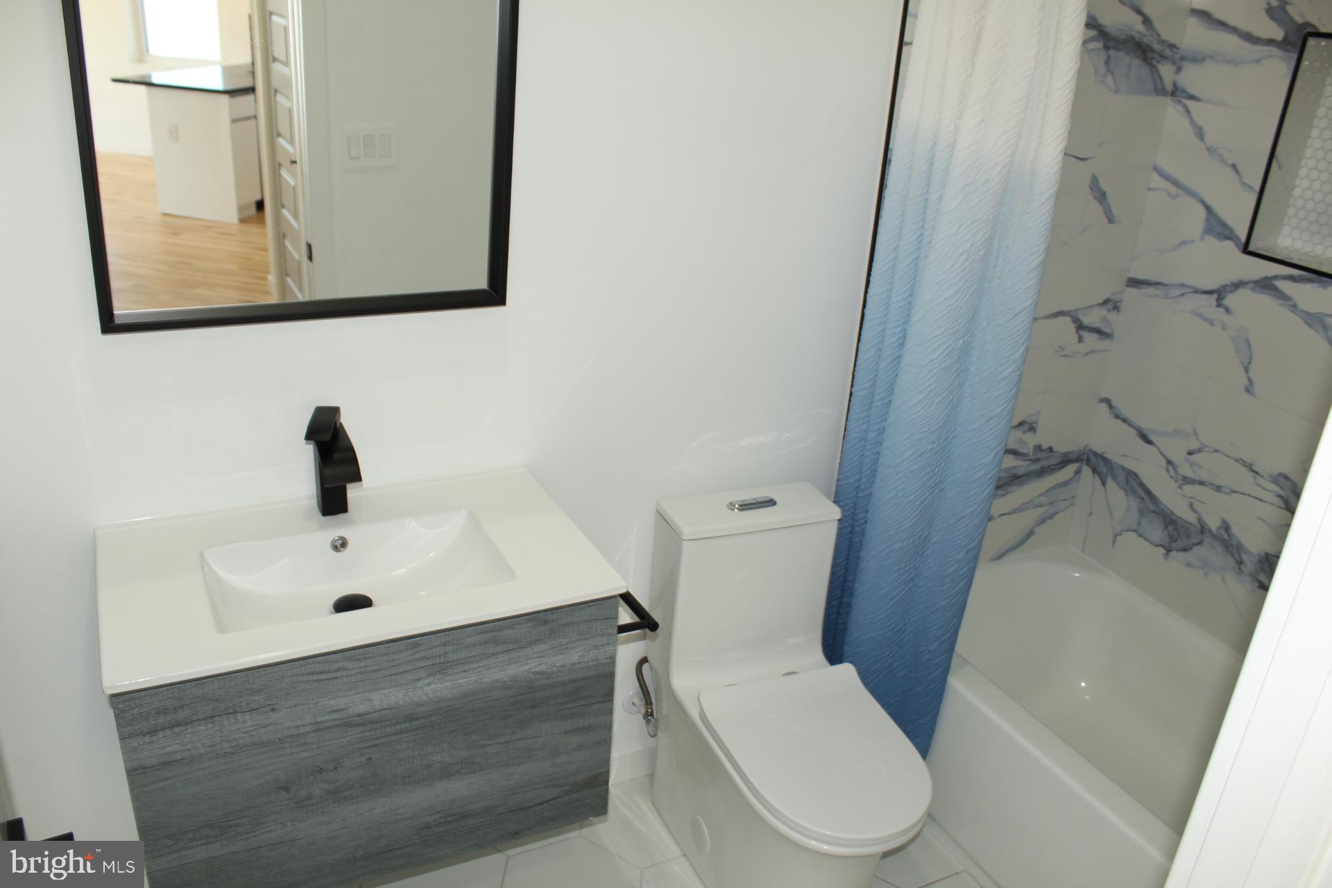 3017 Ridge Avenue, Unit B Philadelphia, PA 19121 - Photo 20 of 29 Modern bathroom with sleek design.