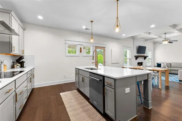 a kitchen with a stove and cabinets