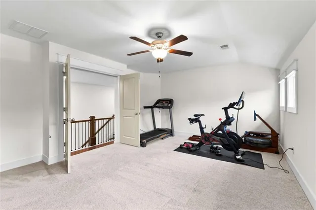 a view of room with gym equipment