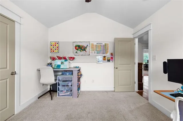 a workspace with furniture and a window