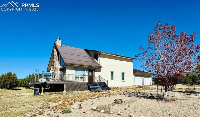 a kitchen with stainless steel appliances granite countertop a stove and a wooden cabinets