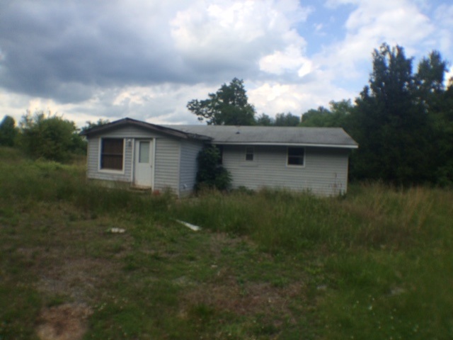 133 Octonia Road Stanardsville, VA 22973 - Photo 1 of 9 a view of house with backyard space