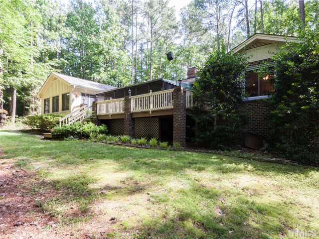 12601 Kristy Circle Raleigh, NC 27613 - Photo 23 of 25 a house view with a garden space