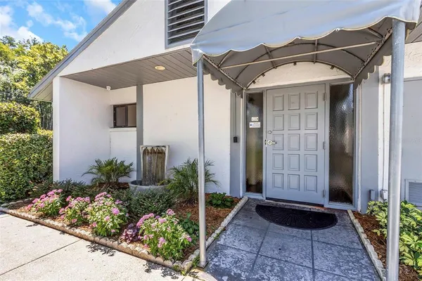 a front view of a house with a glass door
