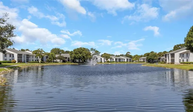 a view of building with lake