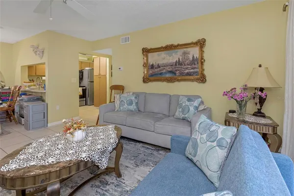 a living room with furniture and a couch