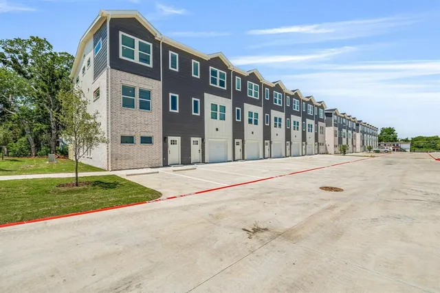 a view of building with yard