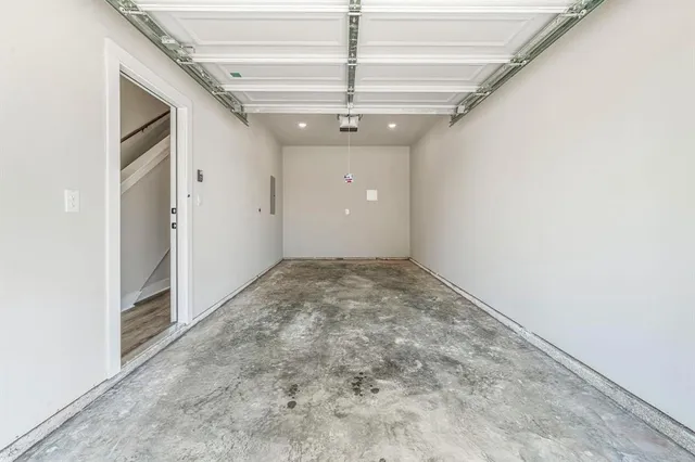 a view of a house with backyard and garden