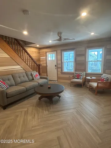 a living room with furniture and window