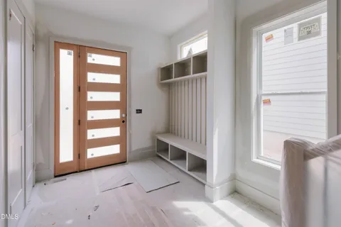 a view of an empty room with a window