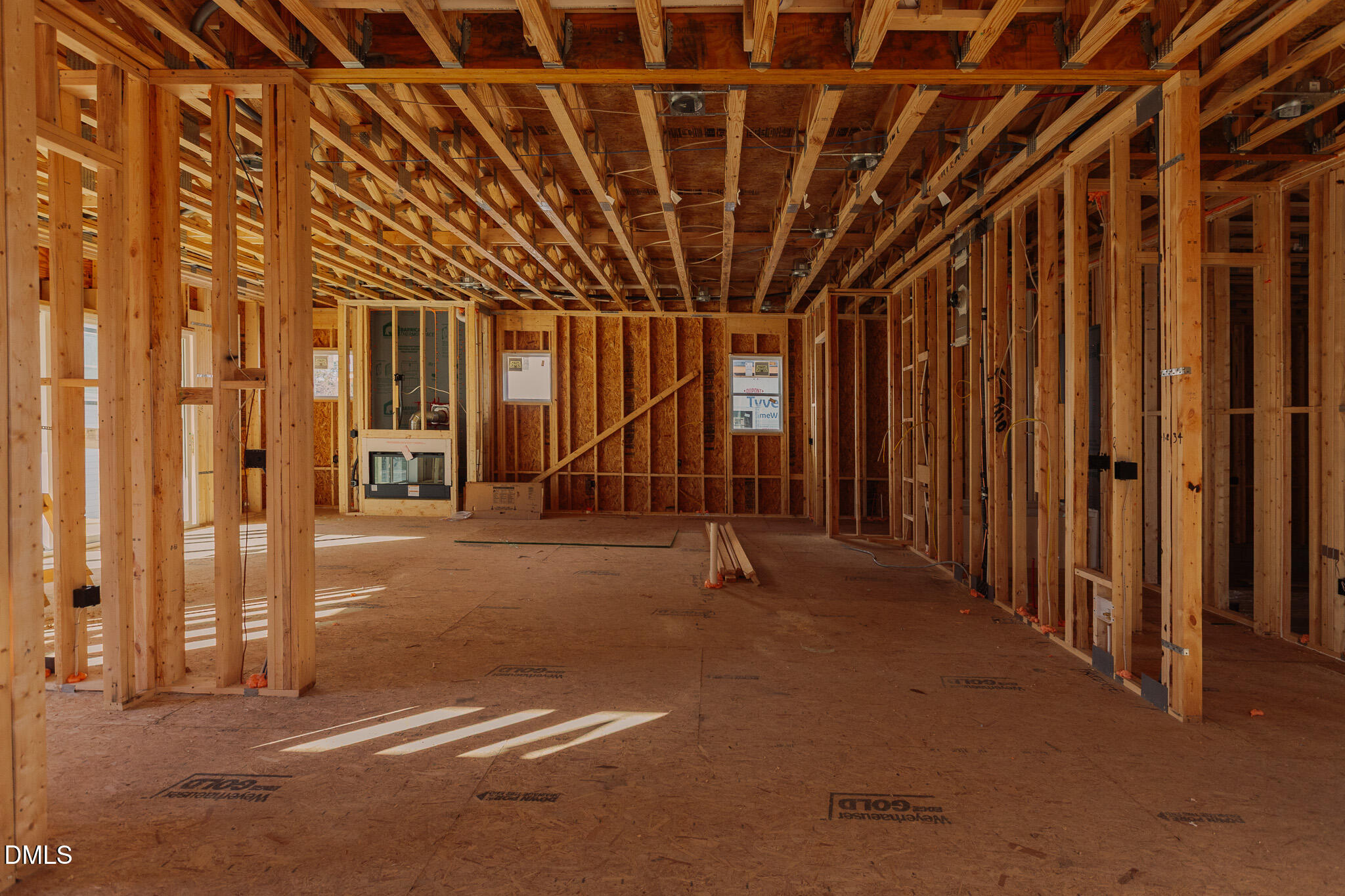 1005 Addison Place Raleigh, NC 27610 - Photo 4 of 47 a view of an empty room with wooden walls