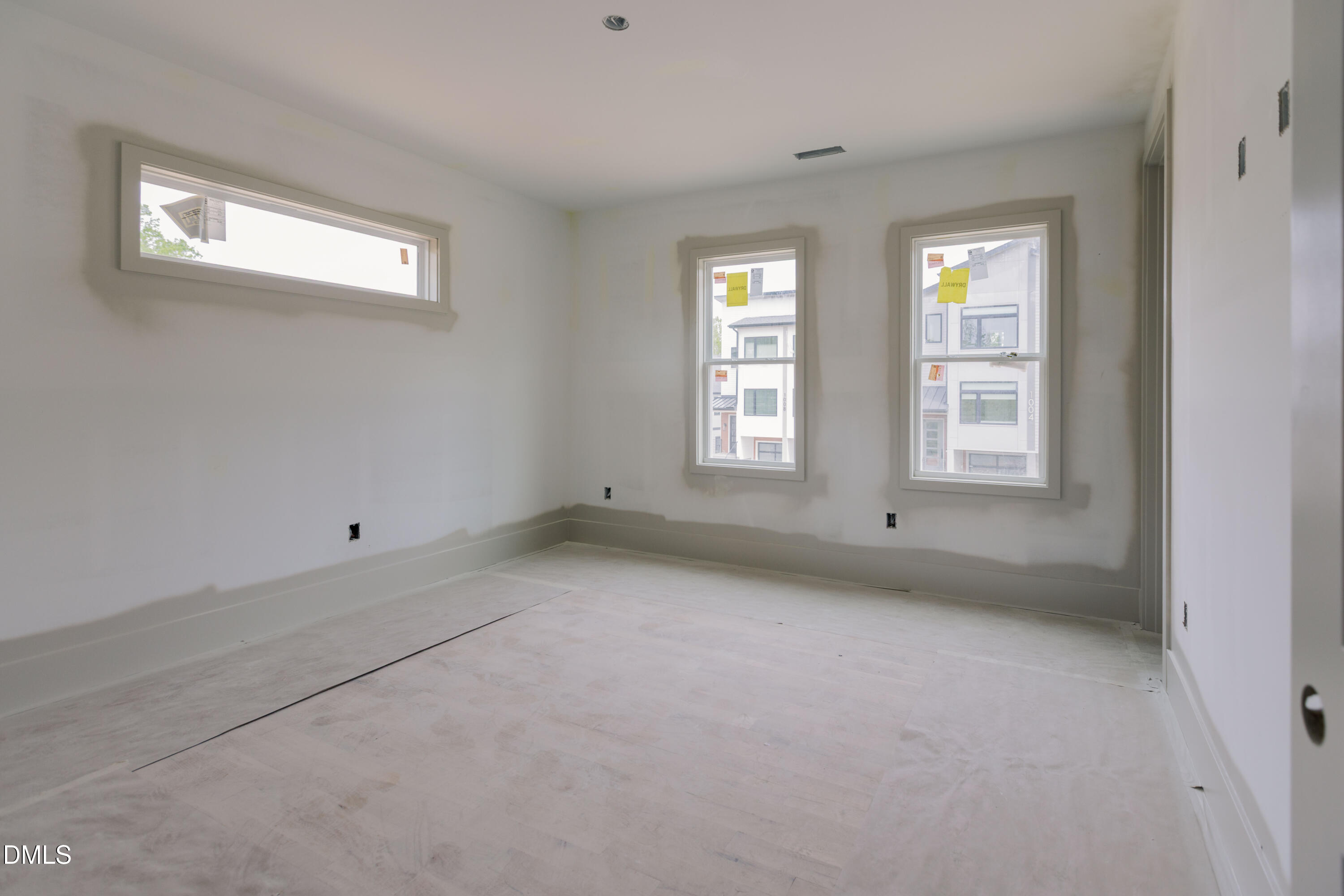 1005 Addison Place Raleigh, NC 27610 - Photo 8 of 42 a view of an empty room with a window